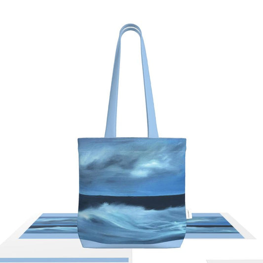 This image features the "Ocean Calm tote bag," an item that combines practicality with artistic design. The tote bag is made from high-quality, natural fabric and boasts twin handles for easy carrying.