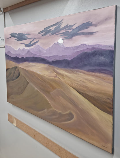 Angled side view of the original Veil of Sand painting, showing the painted canvas and its depth.